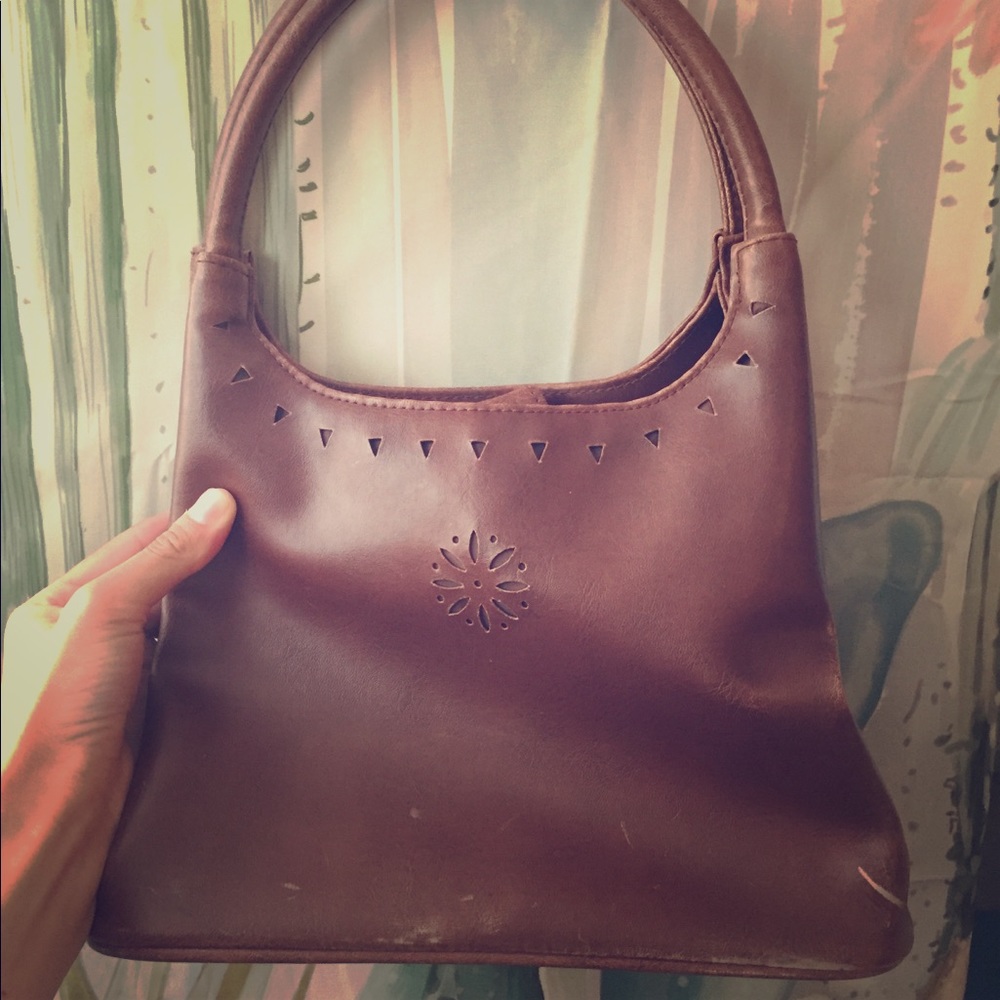Distressed leather handbag